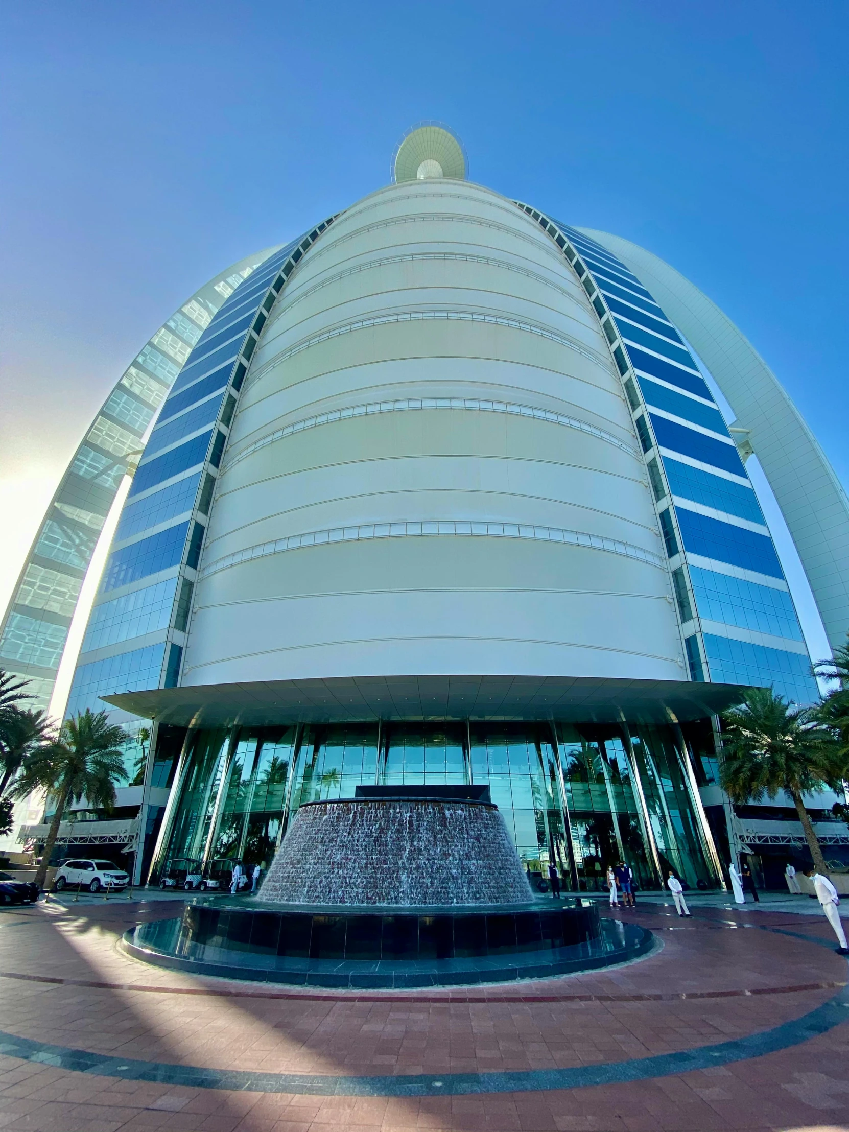 a building with a fountain in front of it, dubai, profile image, futuristic dome, thumbnail