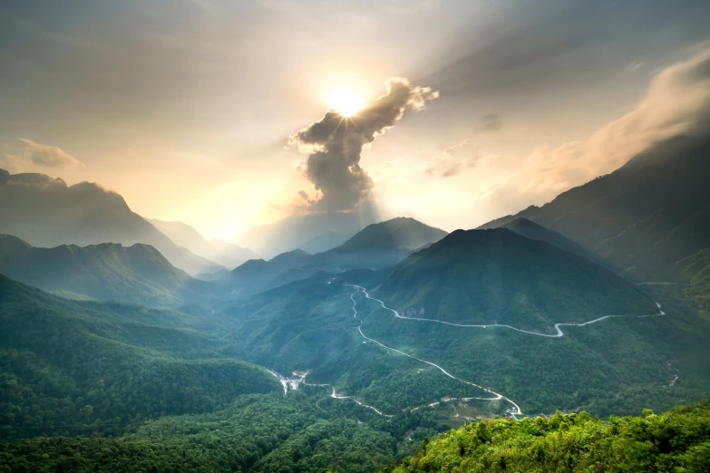 the sun shines through the clouds over the mountains, a matte painting, pexels contest winner, vietnam, light bends to it, post processed, lpoty