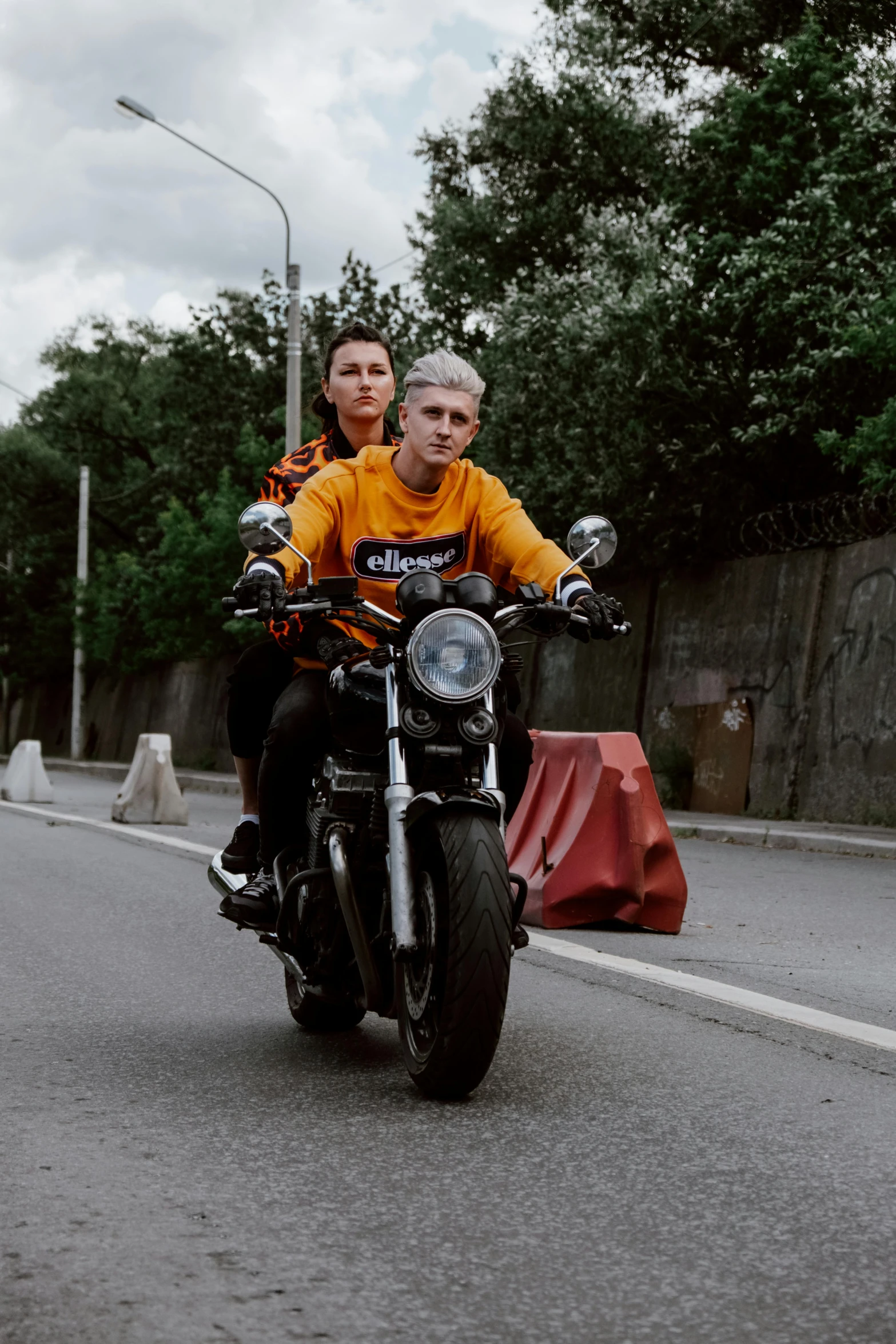 a man and a woman riding on the back of a motorcycle, an album cover, pexels contest winner, non-binary, 000 — википедия, streetwear, ( ( theatrical ) )