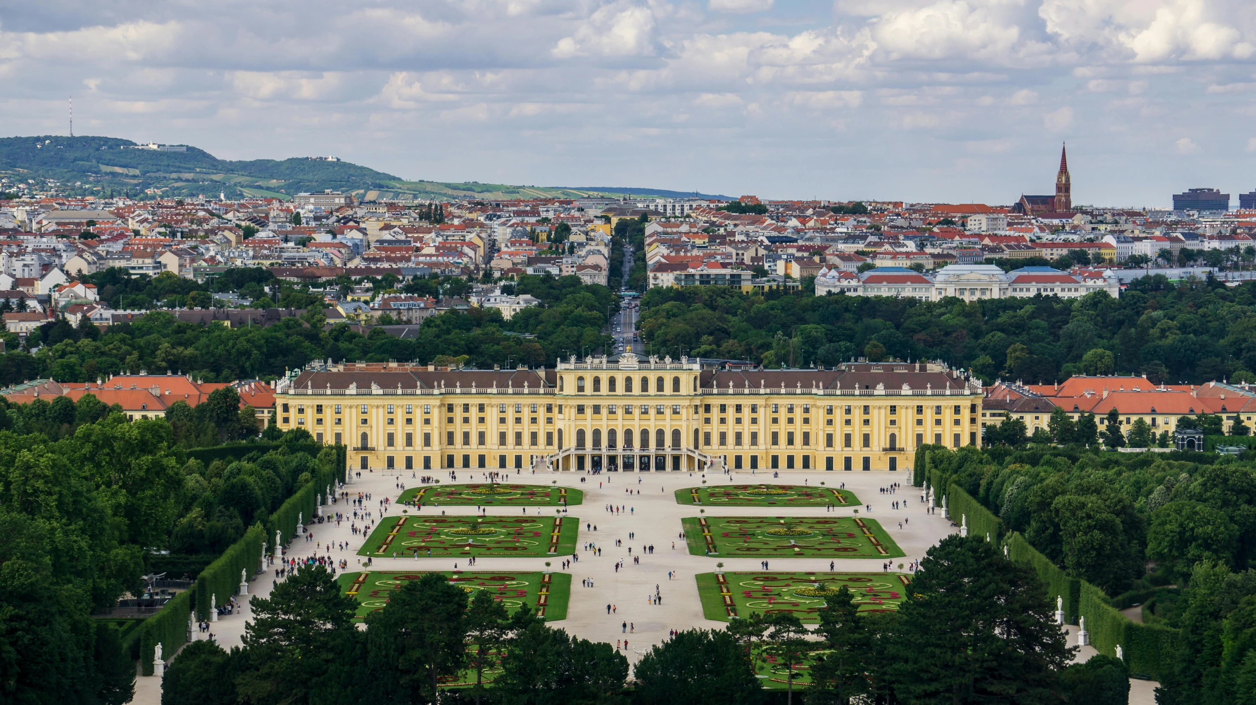 a large yellow building sitting on top of a lush green field, pexels contest winner, rococo, vienna city, the palace of ai, square, mies van der rohe