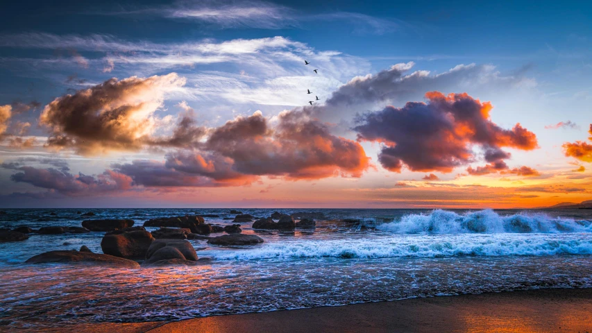 a large body of water next to a beach, pexels contest winner, romanticism, colorful clouds, turbulence, california coast, youtube thumbnail