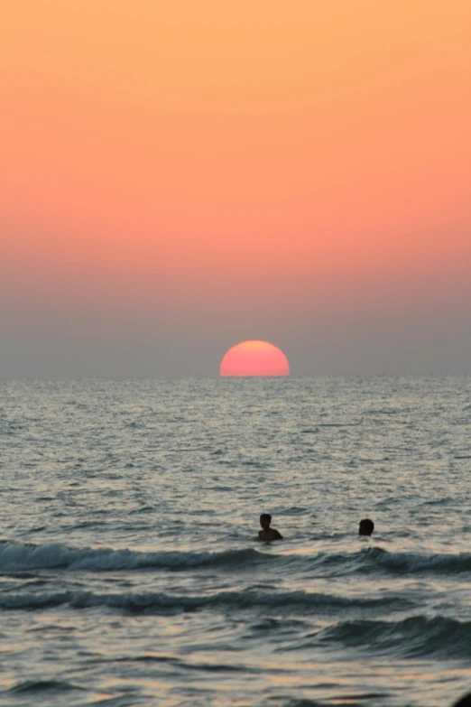 a couple of people that are in the water, by Rajesh Soni, romanticism, multiple suns, zoomed in shots, seaview, no crop