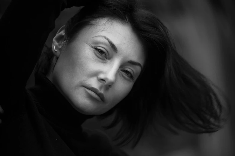 a black and white photo of a woman, by Jan Rustem, dmitry bogdanov, woman with black hair, medium format. soft light, portrait of a 40 years old women