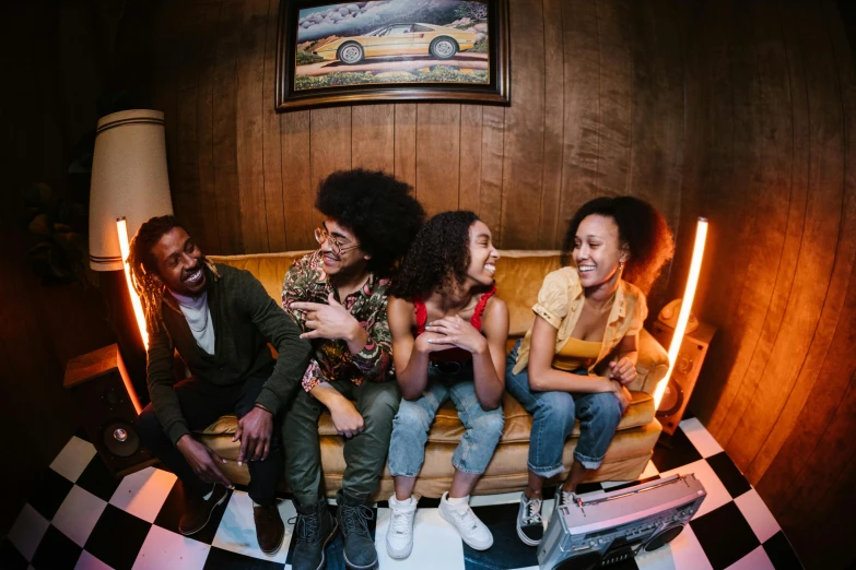a group of people sitting on top of a couch, by Amos Ferguson, pexels contest winner, funk art, ashteroth, playful smirk, lights on, avatar image