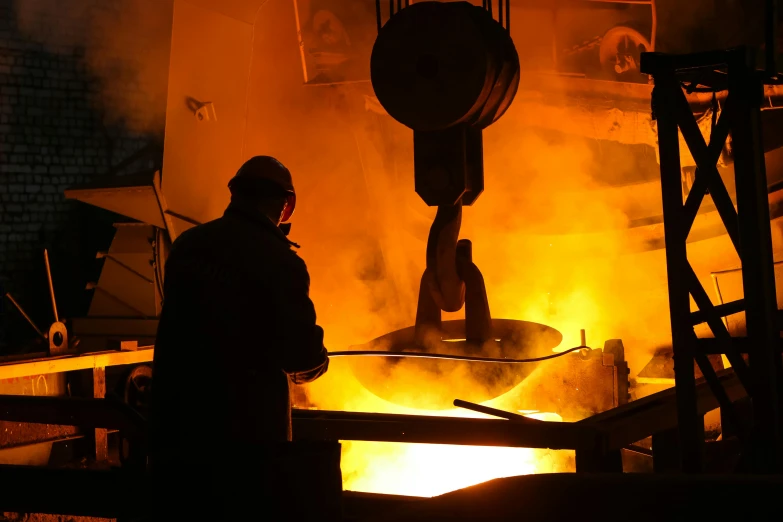 a man that is standing in front of a fire, inside iron and machines, high quality product image”, pouring, safe for work
