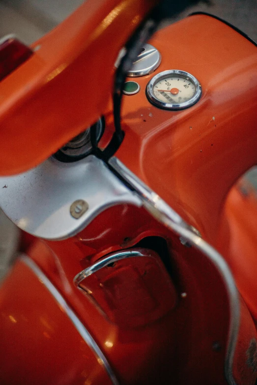 a close up of the handlebars of a motor scooter, by Matt Cavotta, trending on unsplash, photorealism, red and orange colored, 1957, closeup of car engine, 15081959 21121991 01012000 4k