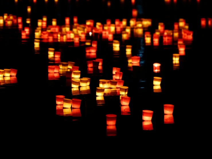 many lit candles are floating in the water, by Daniel Lieske, pexels, hurufiyya, avatar image, orange teal lighting, red lanterns, rectangle