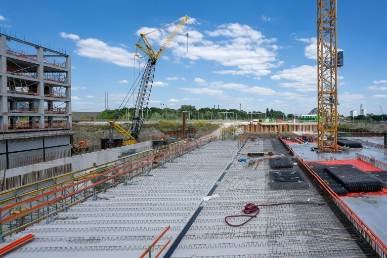 a construction site with a crane in the background, a portrait, by Matthias Stom, unsplash, wide long view, ready to model, panels, on the concrete ground