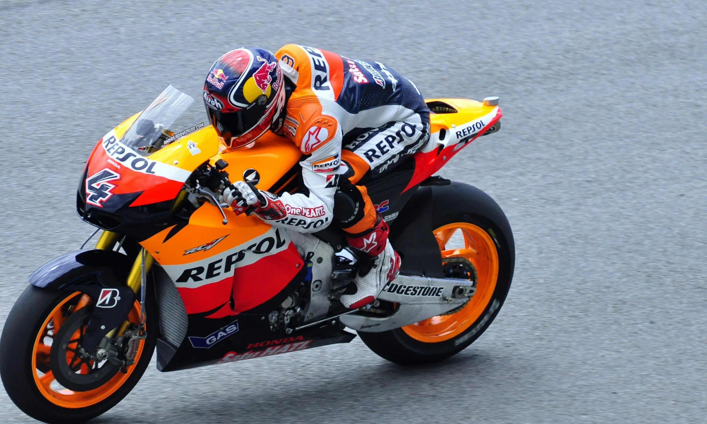 a person riding a motorcycle on a race track, repsol honda, avatar image, getty images, more intense