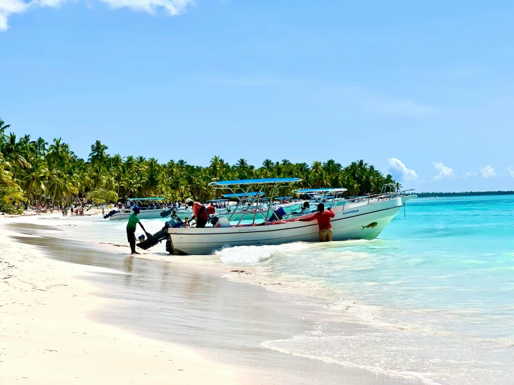 a boat sitting on top of a beach next to the ocean, hurufiyya, avatar image