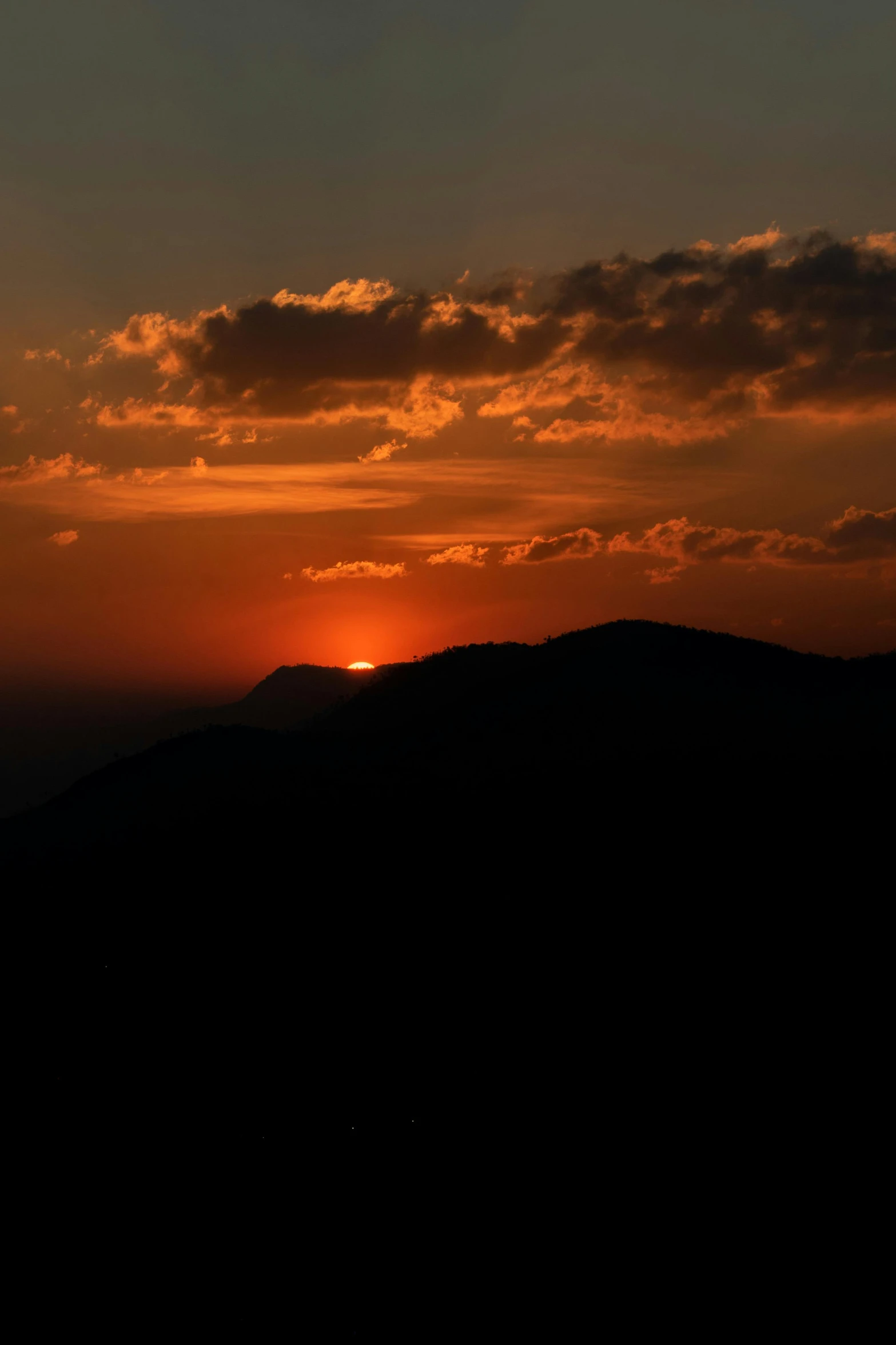 the sun is setting over the mountains in the distance, by Alexis Grimou, silhouette :7, ((sunset))