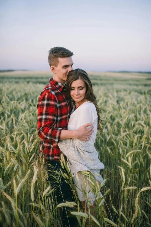 a man and woman standing in a wheat field, pexels contest winner, wearing a flannel shirt, russian girlfriend, well built, romantic lead