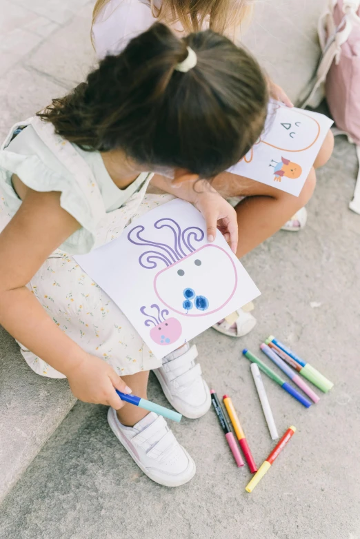 two little girls sitting on the ground drawing with crayons, a child's drawing, pexels contest winner, instagram story, 15081959 21121991 01012000 4k, high quality picture, tonal colors outdoor