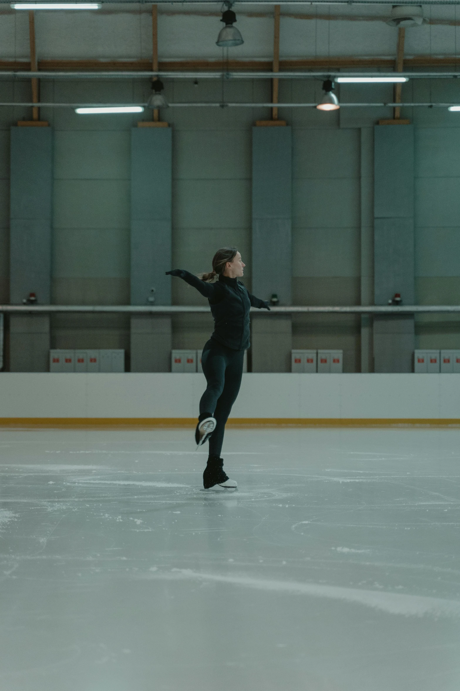 a man riding a skateboard on top of an ice rink, inspired by Fei Danxu, arabesque, 4k movie still, juno promotional image, b - roll, kirsi salonen