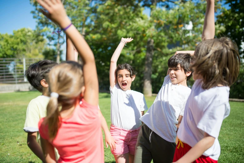 a group of young children playing a game of frisbee, pexels contest winner, figuration libre, with arms up, summer camp, avatar image, high resolution photo