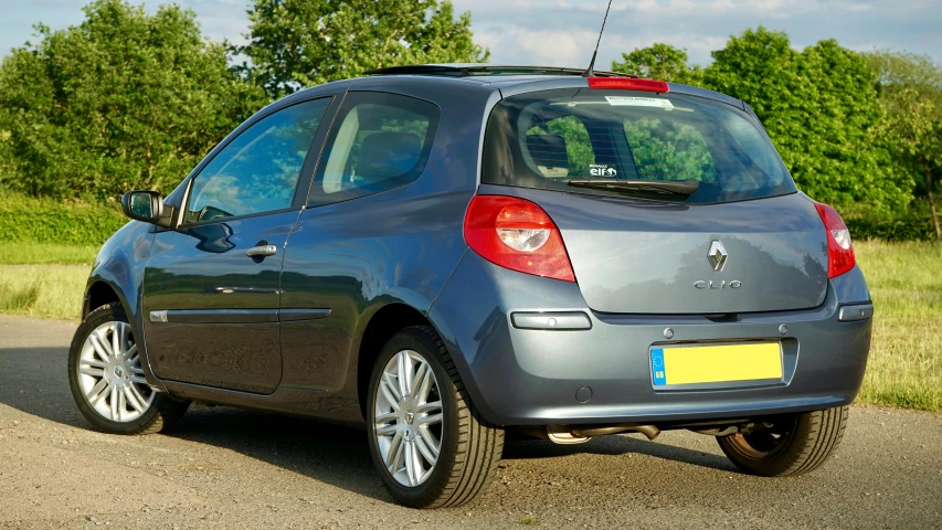 a small car is parked on the side of the road, flickr, renault ultimo, taken in the late 2010s, square, highly detailed in 4 k ”