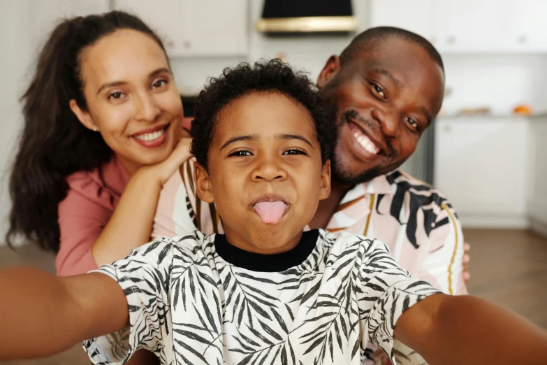 a family taking a selfie in the kitchen, a picture, african facial features, happy with his mouth open, avatar image, thumbnail