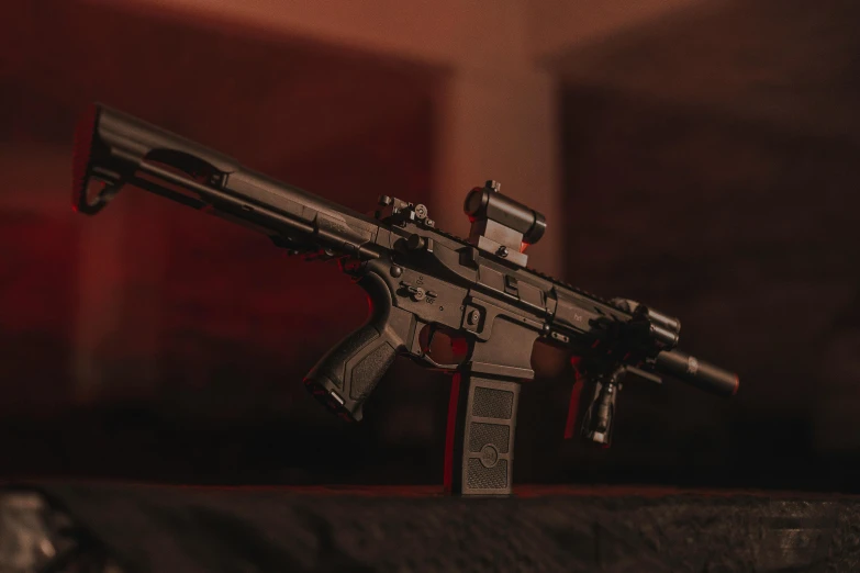 a toy gun sitting on top of a table, taken in the night, holding ar-15, red weapon 8 k s 3 5, profile picture 1024px