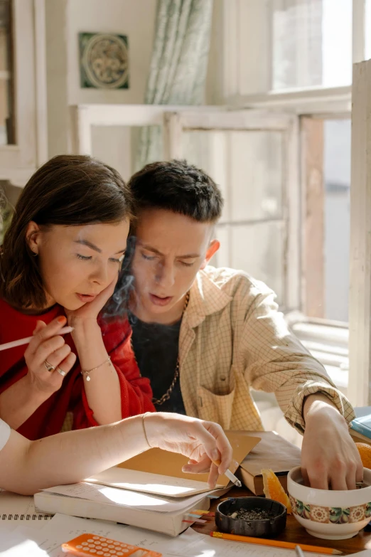 a couple of people that are sitting at a table, trending on pexels, visual art, studious, chinese artist, bright natural light, still frame from a movie