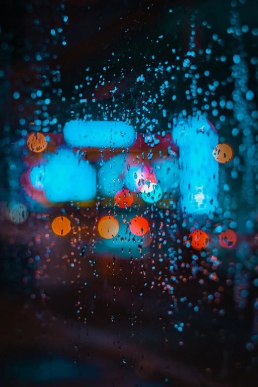 rain drops on the windshield of a car at night, a picture, inspired by Elsa Bleda, unsplash contest winner, colorful city, cyan and orange, made out of rain, hasselblad film bokeh