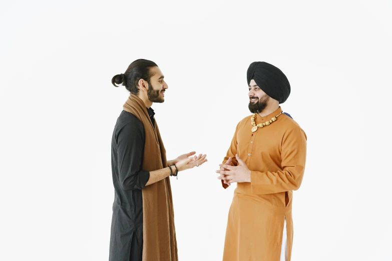 a couple of men standing next to each other, by Manjit Bawa, trending on pexels, renaissance, calmly conversing 8k, plain background, religious, charts