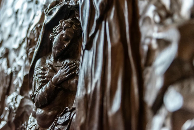 a close up of a statue of a woman holding a child, by Giuseppe Avanzi, unsplash, mannerism, the three marys at the sepulchre, intricate carved wood, thumbnail, brown