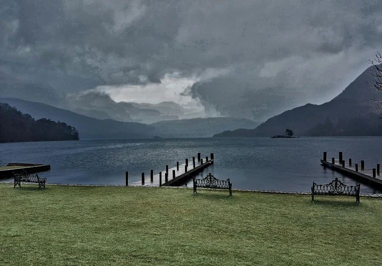 a group of benches sitting on top of a lush green field, a colorized photo, inspired by Michael James Smith, pexels contest winner, renaissance, overcast lake, near a jetty, loch ness monster, dark gloomy