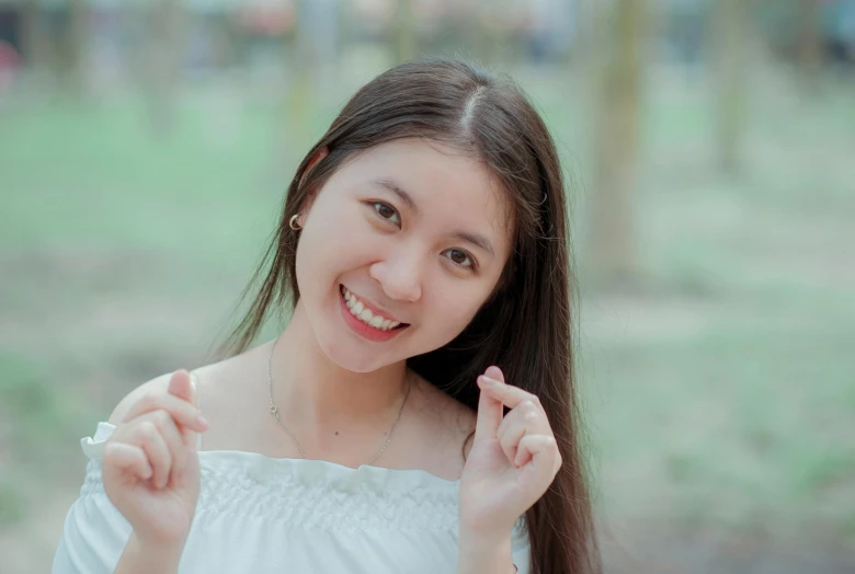 a woman in a white dress posing for a picture, inspired by Kim Jeong-hui, pexels contest winner, realism, she has perfect white teeths, wearing a cute top, avatar image, 8k 50mm iso 10