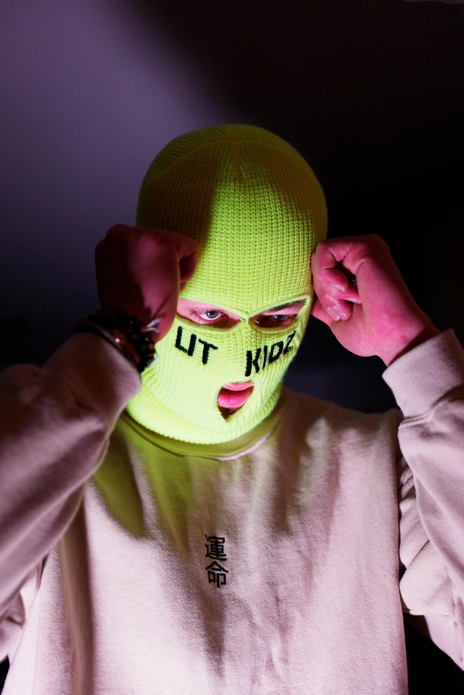 a man wearing a neon green ski mask, inspired by Károly Brocky, kitsch movement, anti life, lit from below, off - white collection, instagram picture