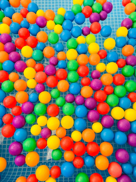 a pool filled with lots of colorful balls, a picture, pexels, process art, 2 5 6 x 2 5 6 pixels, educational, sweets, colorful]”