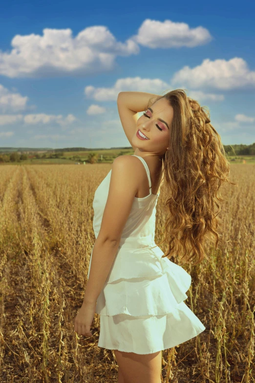 a woman in a white dress standing in a field, shutterstock contest winner, wavy hair yellow theme, russian girlfriend, playful smile, with textured hair and skin