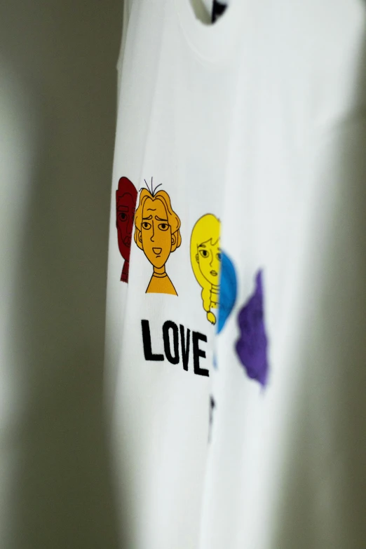a white t - shirt with cartoon characters on it, a cartoon, inspired by Jim Dine, flickr, detail shot, lovercraft, embroidered robes, high quality photo