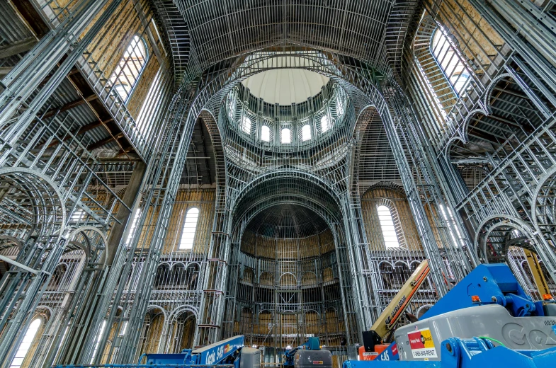 a large metal structure inside of a building, inspired by Thomas Struth, art nouveau, alabaster gothic cathedral, dome, thumbnail, under repairs