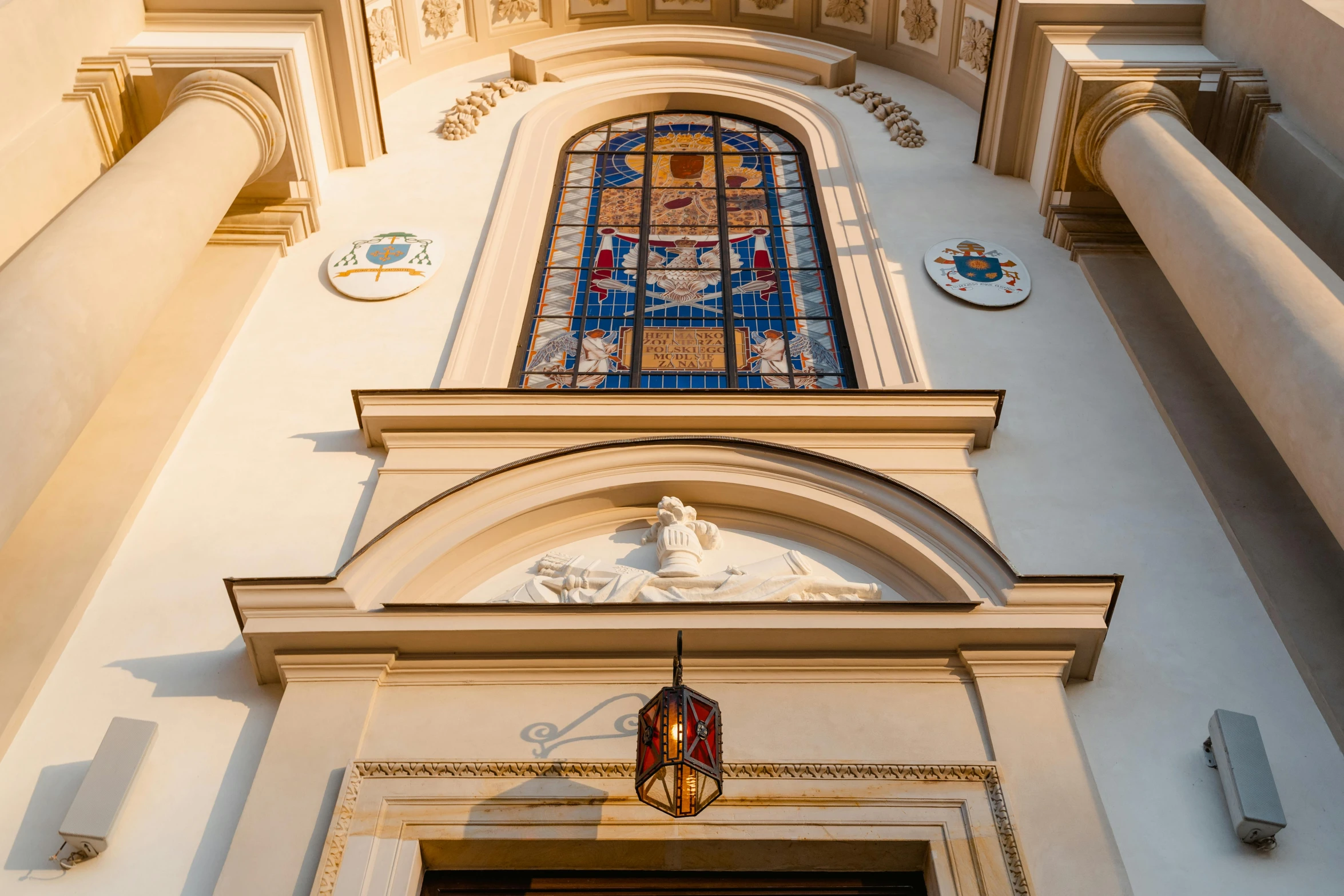 a clock that is on the side of a building, a photo, by Konrad Witz, pexels contest winner, neoclassicism, church window, golden light, entrance, thumbnail