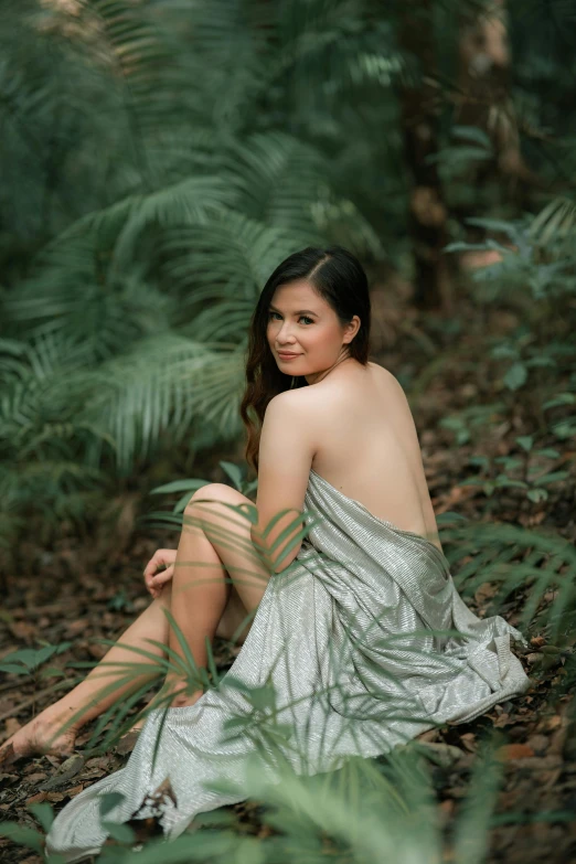 a woman in a silver dress sitting in the woods, inspired by Fernando Amorsolo, unsplash, cute photo, disrobed, philippines, greenish skin