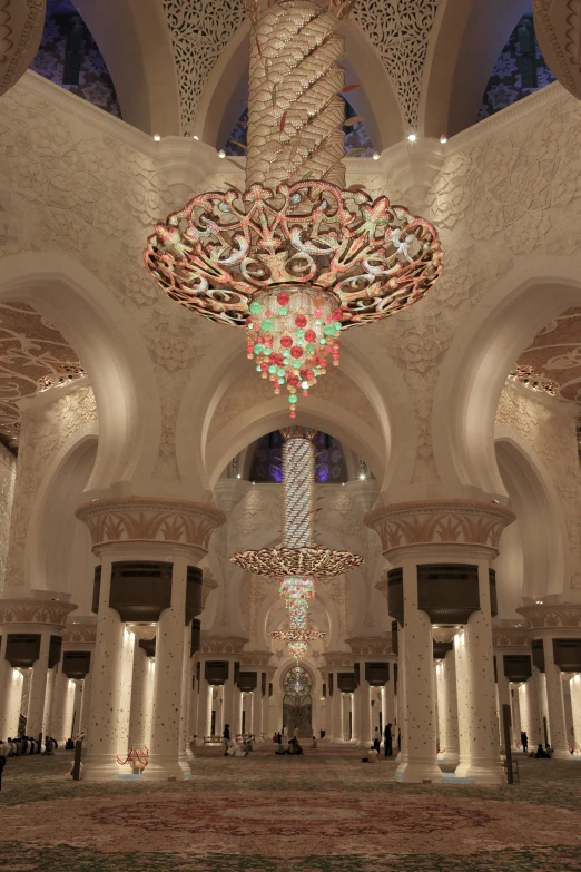 a large chandelier hanging from the ceiling of a building, a digital rendering, inspired by Frederick Goodall, cybermosque interior, in disney, 2 5 6 x 2 5 6 pixels, cinematic accent lighting