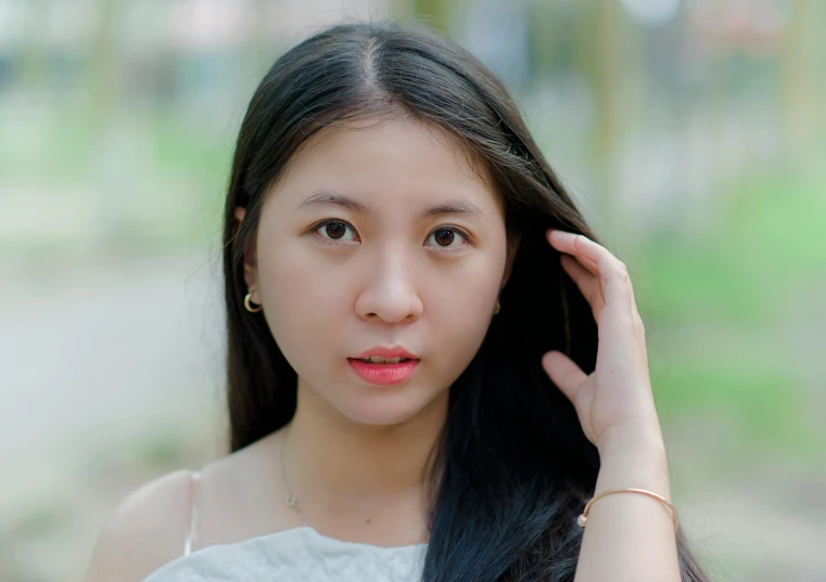 a woman with long black hair posing for a picture, inspired by Tang Yifen, pexels contest winner, realism, fair complexion, half body photo, girl with brown hair, f / 1. 9 6. 8 1 mm iso 4 0