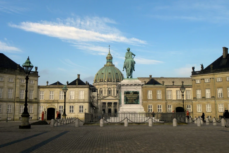 a large building with a statue in front of it, by Jan Tengnagel, neoclassicism, nordic crown, dome, 🚿🗝📝, profile image