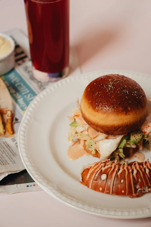 a close up of a plate of food on a table, bun ), crabcore, pink, holding toasted brioche bun