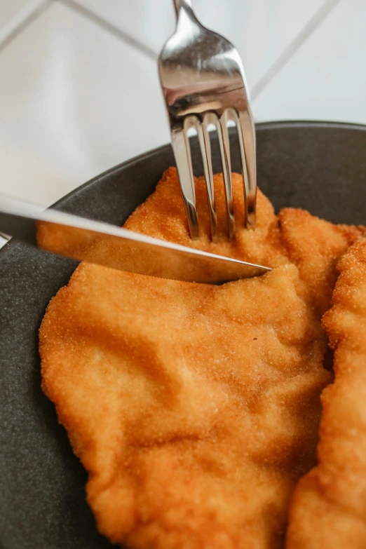 a close up of a plate of food with a fork, a digital rendering, by Andries Stock, unsplash, renaissance, deep fried, eastern european, filleting technique, buxom