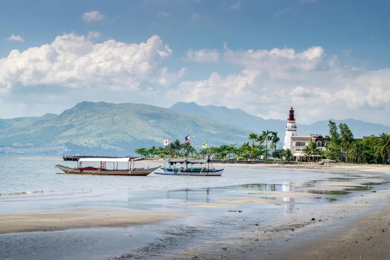 a couple of boats sitting on top of a sandy beach, mountains and ocean, upon a peak in darien, fishing village, avatar image