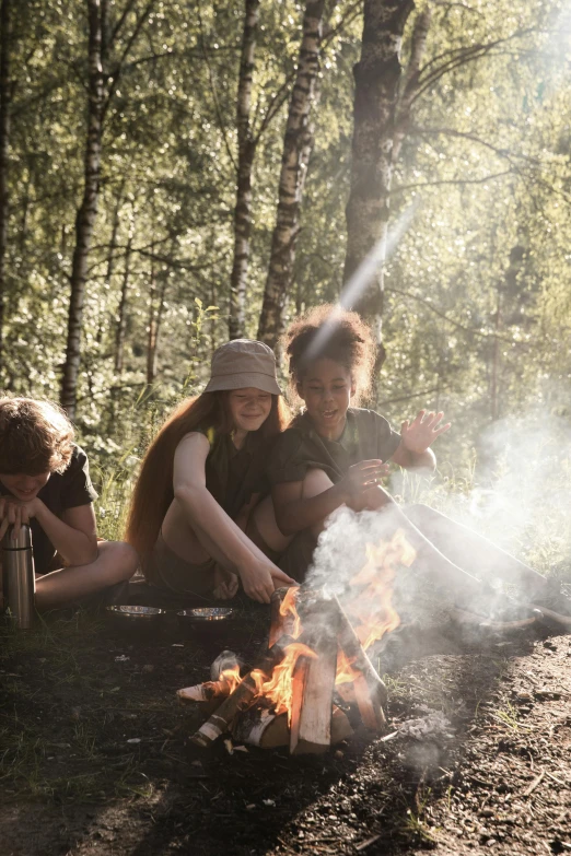 a group of people sitting around a campfire, by Jaakko Mattila, kids playing, wilderness, girls resting, instagram post