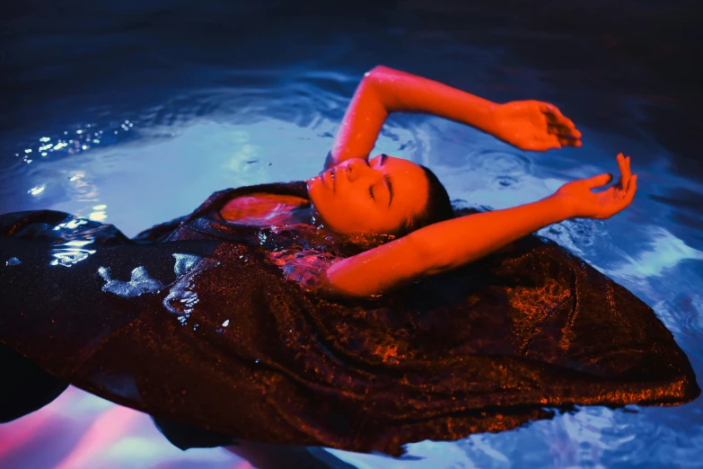 a woman in a dress floating in a pool, an album cover, pexels contest winner, soft devil queen madison beer, at night, takato yomamoto. 4 k, performing a music video