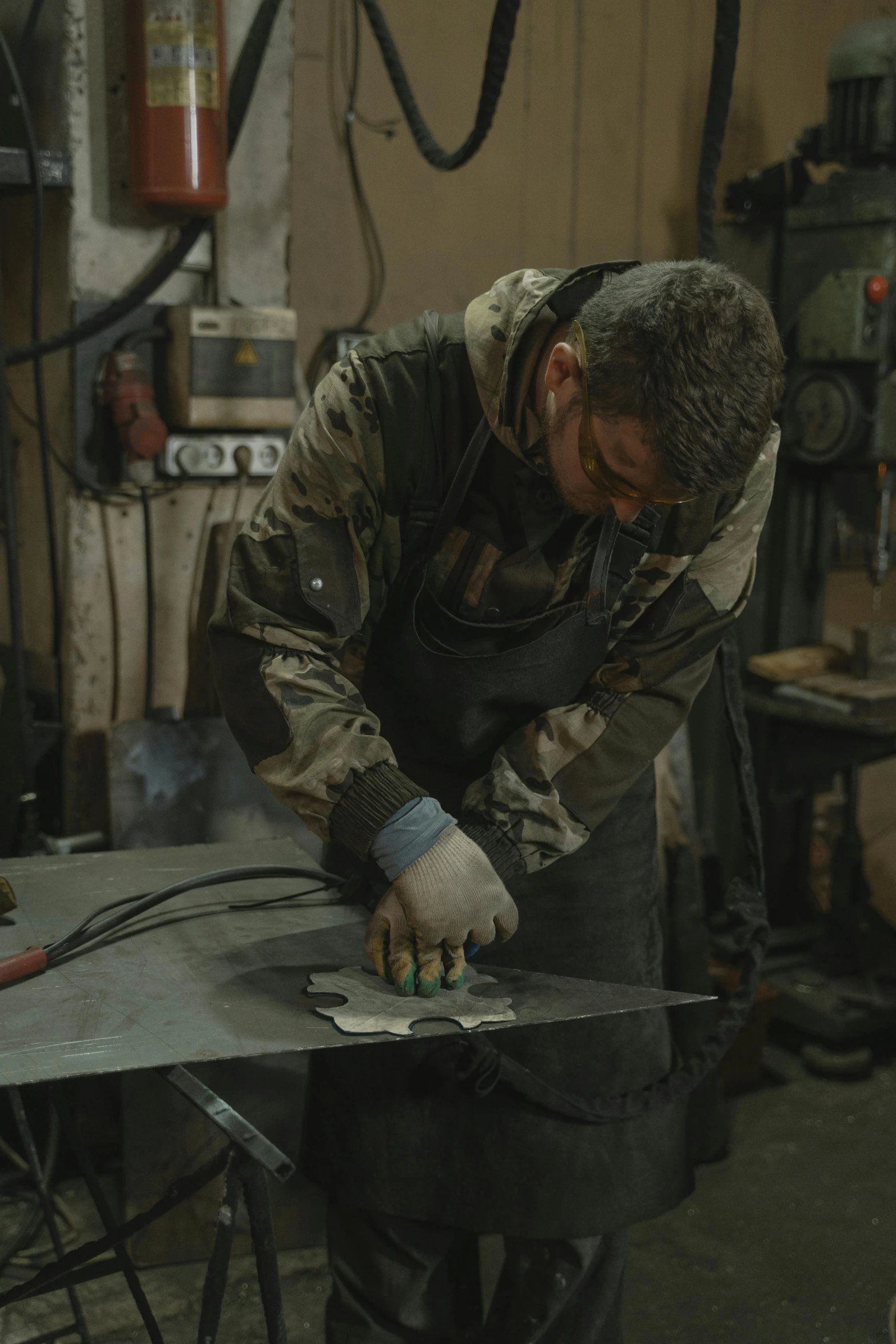 a man working on a piece of metal, trending on imdb, full body hero, profile image, engraved