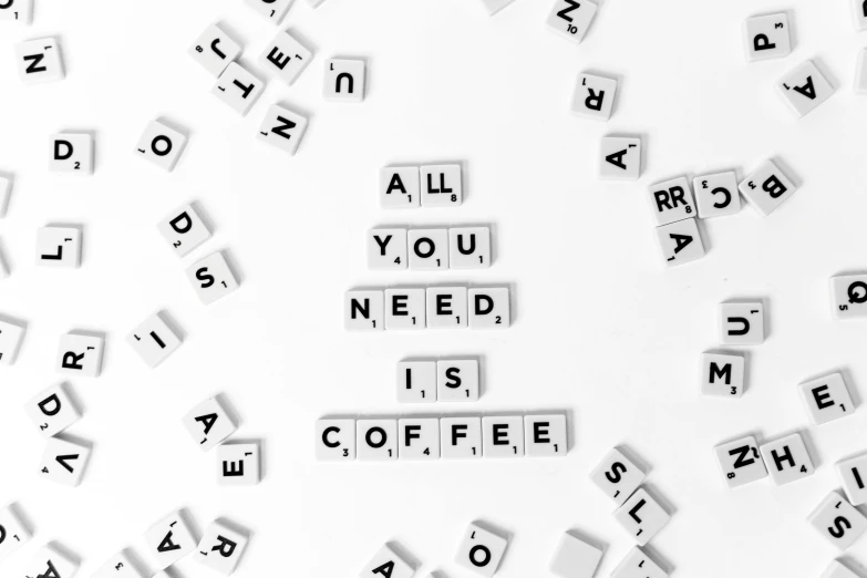 letters that spell out all you need is coffee, by Emma Andijewska, trending on unsplash, minimalism, 🦩🪐🐞👩🏻🦳, squares, we all need control, abcdefghijklmnopqrstuvwxyz