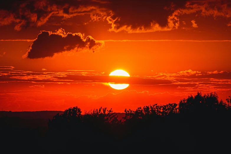 the sun is setting behind the clouds in the sky, pexels contest winner, romanticism, red and orange colored, instagram post, heat waves, summer setting