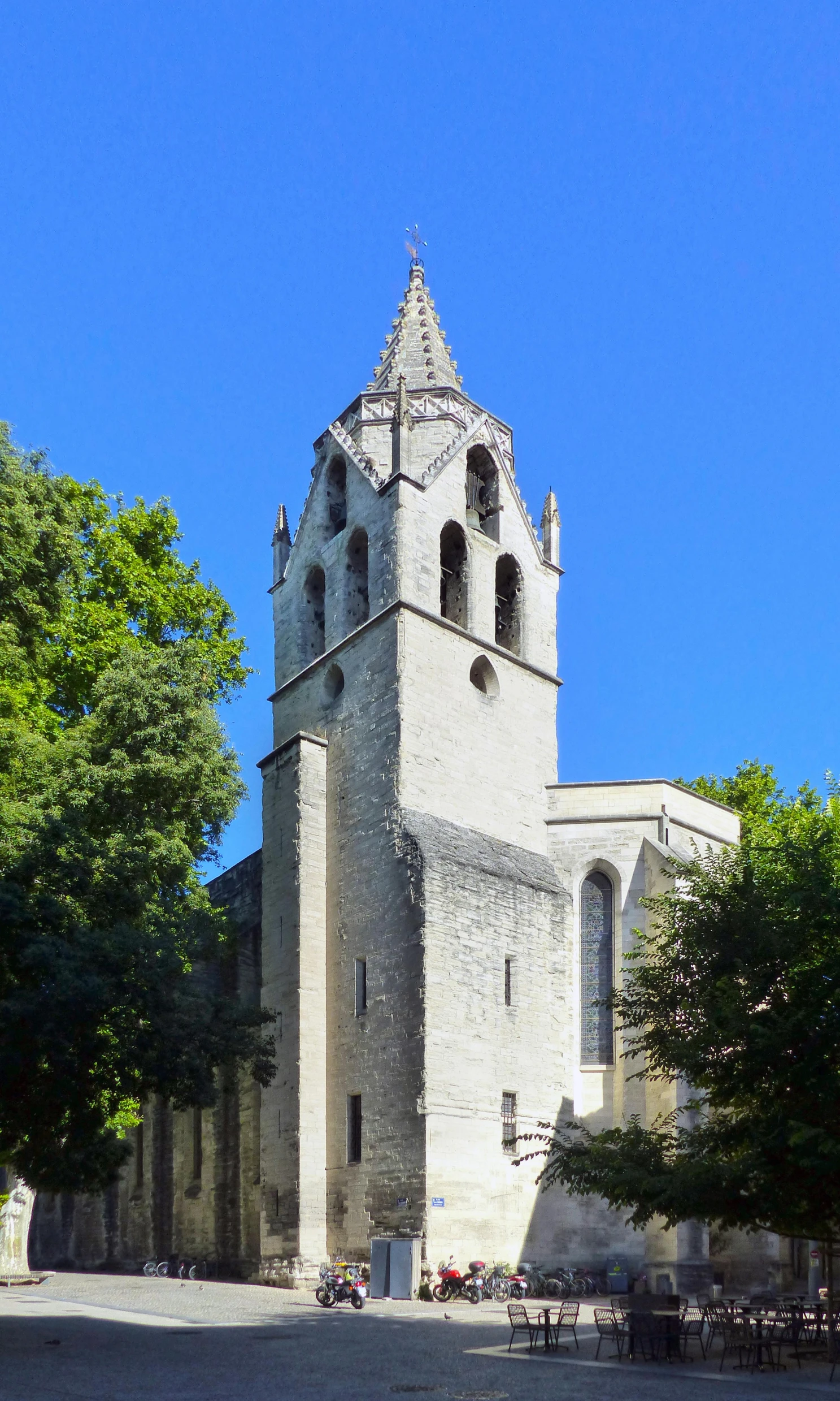 a tall tower with a clock on top of it, inspired by François Barraud, romanesque, limestone, the narthex, panoramic shot, streetview