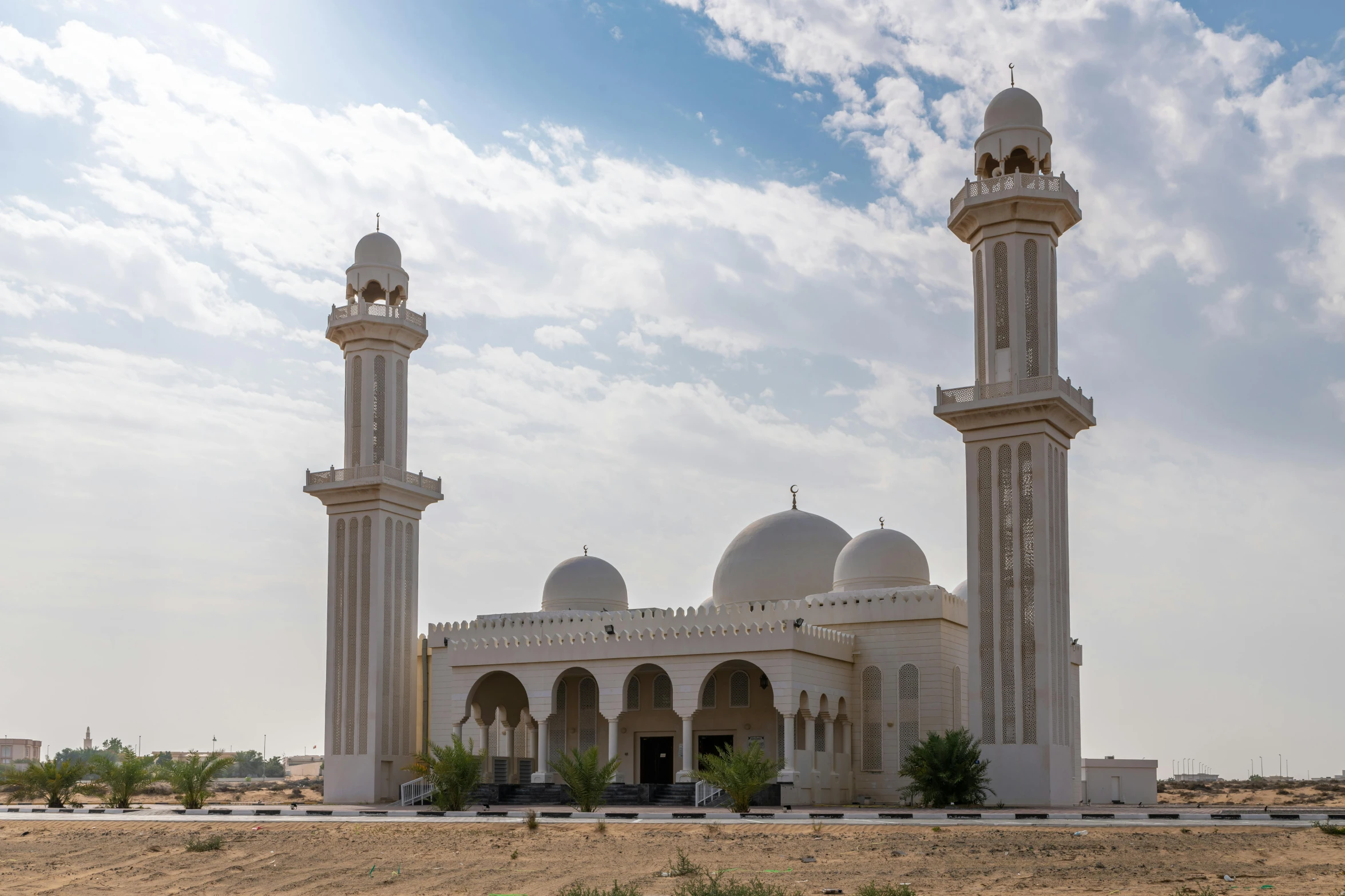 a large white building sitting in the middle of a desert, a picture, hurufiyya, shrines, parks and monuments, grey