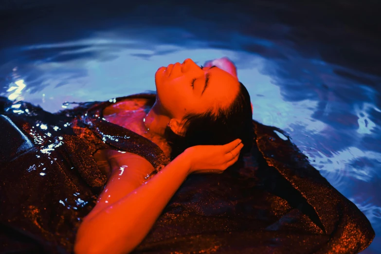 a woman laying in a pool of water, red and blue lighting, onsens, profile image, float