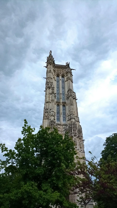 a tall tower with a clock on top of it, by Matthew Smith, unsplash, art nouveau, alabaster gothic cathedral, detmold charles maurice, square, photo taken in 2018